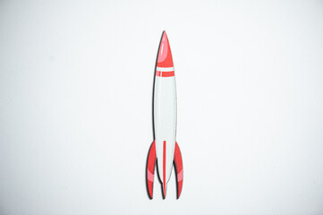 Obraz premium Wood rocket shape, white background