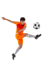 Fototapeta premium Professional football, soccer player in motion isolated on white studio background. Concept of sport, match, active lifestyle, goal and hobby