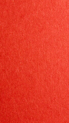 red background with thick paper texture. uneven lighting. Vertical image.