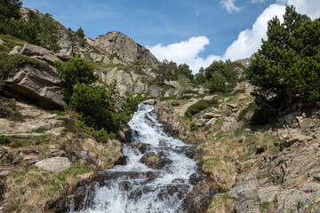 Fototapeta na wymiar Waterfall in the Vall de Incles in Andorra in spring 2022