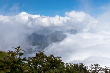Sea of clouds over mountains, forming a wave over the summits, sea of fog, mountain with fog, Teresópolis, Rio de Janeiro, Brazil