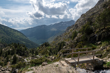 Fototapeta na wymiar Bridge the Vall de Incles in Andorra in spring 2022.