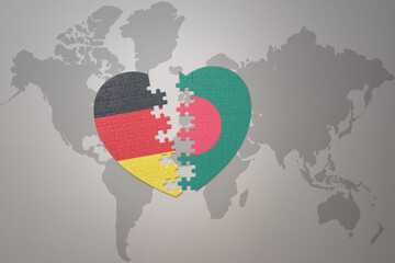 puzzle heart with the national flag of bangladesh and germany on a world map background. Concept.