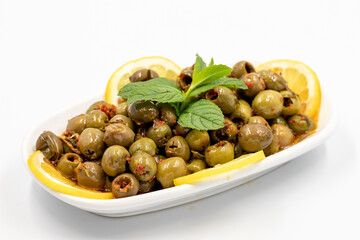 Green olive. Olives with special sauce isolated white background. Healthy food. close up
