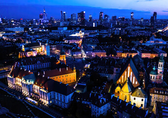 Fototapeta na wymiar Warsaw, Poland Cityscape with high angle above aerial view of historic architecture buildings in old town market square at night