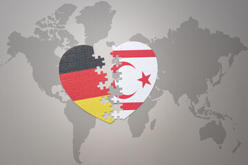 puzzle heart with the national flag of northern cyprus and germany on a world map background. Concept.