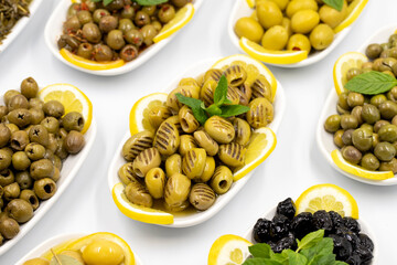 Olives. Varieties of olives on white background. Healthy food. Selective focus olive. close up