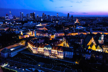 Warsaw, Poland  Cityscape with high angle above aerial view of historic architecture buildings in old town market square at night
