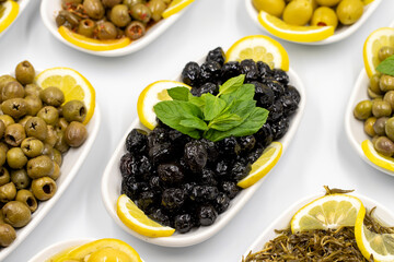 Olives. Varieties of olives on white background. Healthy food. Selective focus olive. close up