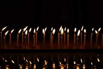 blur image of Candle light in the dark and bokeh