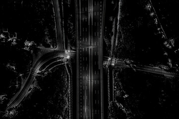 Aerial view of landscape perfect night road, top view at night traffic long exposure. color tone effect. Black and white