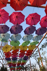 many colorful umbrellas on the top design for creative and fantacy lifestyle