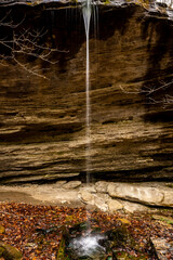 Small Waterfall Pours Over Rock Cliff In Mammoth Cave