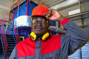 Portrait Of African American Worker In Protective Workwear In Central Boiler Plant