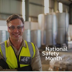 National safety month text by smiling caucasian male worker in workwear at industry, copy space