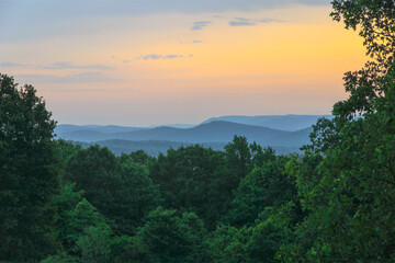 A beautiful sunset over the layers of mountains in Buffalo City, Arkansas 