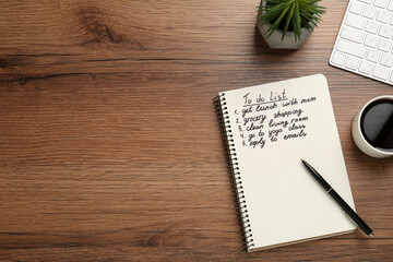 Flat lay composition with to do list on wooden table, space for text - Powered by Adobe