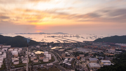 Fototapeta na wymiar Aerial view of Oil and gas industry - refinery, and Petrochemical plant on island at evening sunset background