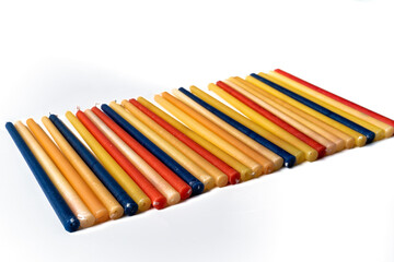 Fototapeta premium Festive composition with traditional Jewish candles for the Hanukkah holiday isolated on white background.
