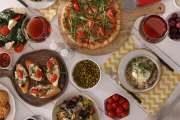 Many different dishes served on buffet table for brunch, flat lay