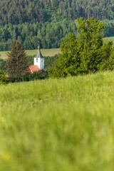 Church tower. View of the rural Gothic church of St. Martina. Village Dolni Loucky - Czech Republic - Europe. Built in the middle of the 13th century.