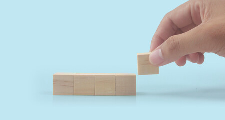  Wooden cubes in hand with copy space for input wording