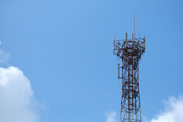Telephone towers with sky and clouds in the background, Copy space