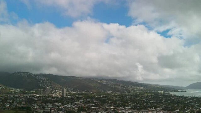 Time lapse of Kahala Oahu on a sunny day with clouds and blue sky
