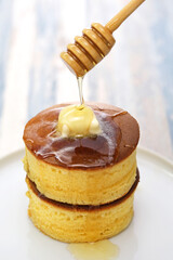 Japanese fluffy thick pancake and honey dipper