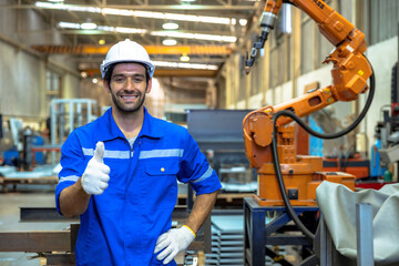 Young worker working in industry factory.