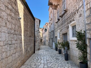 Fototapeta na wymiar Old alley in Hvar Town, Croatia