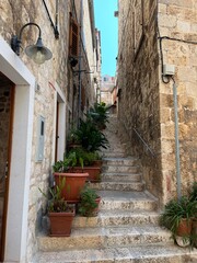 Fototapeta na wymiar Old alley in Hvar Town, Croatia