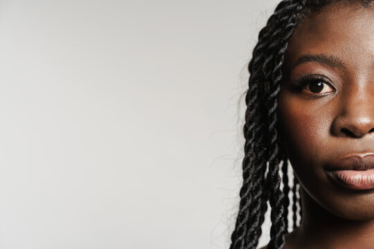 Shirtless Black Woman With Afro Pigtails Posing On Camera