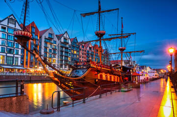 The old town of Gdansk with pirate ship at night, Poland