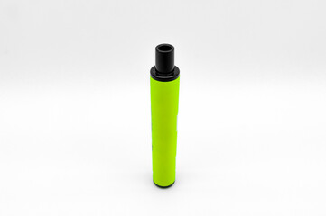 Modern electronic cigarette on a white background. Fashionable smoking device. E-cigarette for vaping. Trendy vape pod. Selective focus