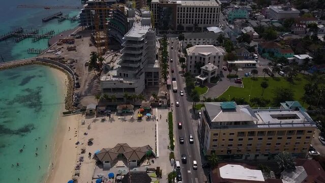 Aerial view of traffic in downtown Nassau in the Bahamas islands - tilt, drone shot