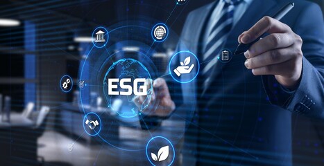 ESG environmental social governance business strategy investing concept. Businessman pressing...