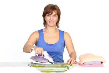 Young smiling woman is ironing a shirt with a shirt iron on white background.