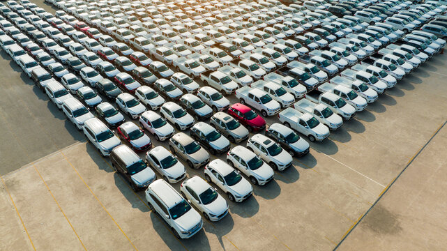 Aerial view a lot of new car for import and export shipping by ship; Smart dealership at car depot; Car at car park before shipping to customer; Car after production at Smart Factory industry 