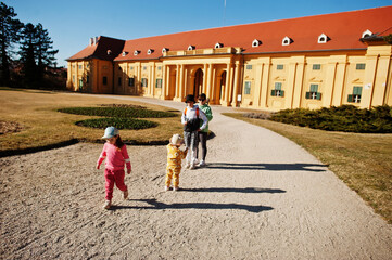 Mother with four kids at Lednice castle, Czech Republic.