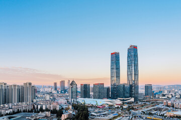 Dusk scenery of the twin towers and city skyline of Kunming, Yunnan, China