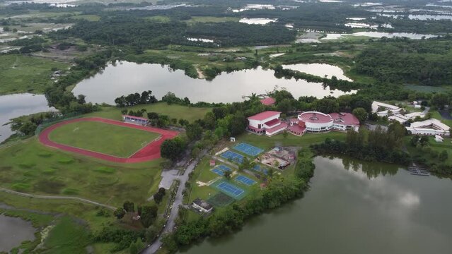 Aerial view Rakan Muda Complex Kampar near abandoned tin mining lake