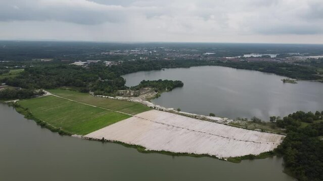 Fly over plantation near abandoned mining lake at Kampar, Perak