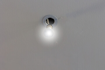 led down light hanging out of socket