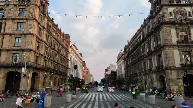 timelapse of several cars at the entrance to the zocalo in mexico city