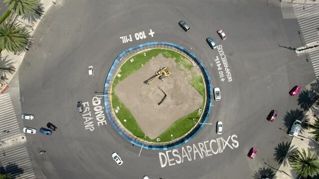 rotating shot over Paseo de la Refroma avenue of the demand for social justice in mexico with little vehicular traffic