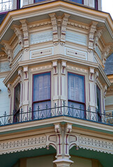 Fototapeta na wymiar Victorian balcony windows exterior details.