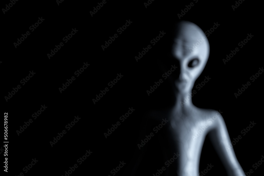 Poster blurred background scary gray humanoid alien. 3d rendering