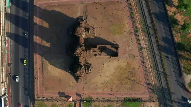 Aerial view of Pra Prang Sam Yod or Phra Prang Sam Yot ruin temple with monkeys, in Lopburi, Thailand
