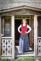 Latvian woman in traditional clothing. Ligo folk.
